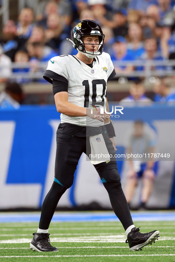 DETROIT,MICHIGAN-NOVEMBER17:  Quarterback Mac Jones (10) of the Jacksonville Jaguars walks on the field during a game between the Detroit Li...