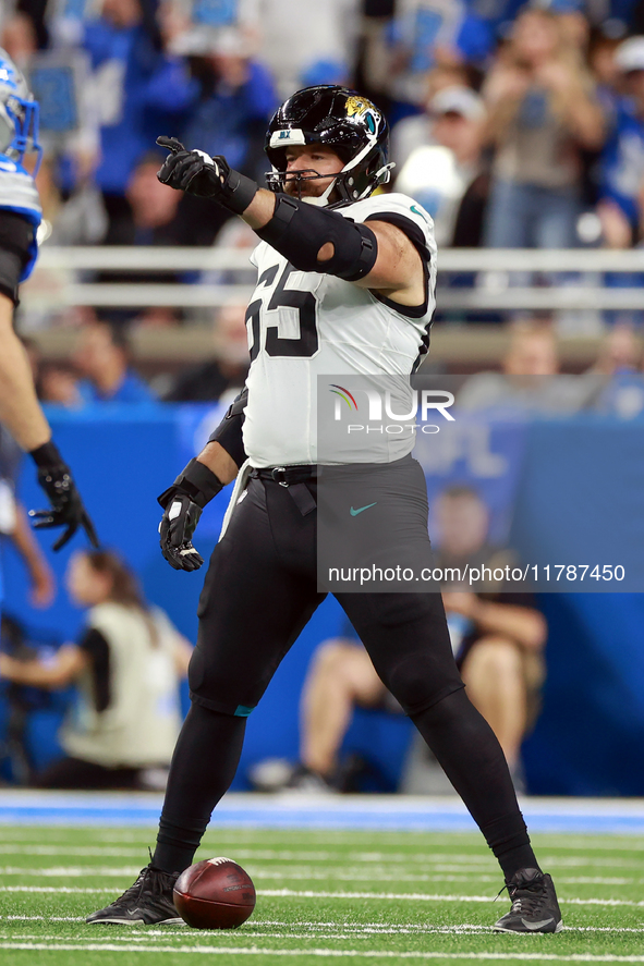 DETROIT,MICHIGAN-NOVEMBER17:  Center Mitch Morse (65) of the Jacksonville Jaguars signals at the line of scrimmage during a game between the...