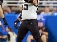 DETROIT,MICHIGAN-NOVEMBER17:  Center Mitch Morse (65) of the Jacksonville Jaguars signals at the line of scrimmage during a game between the...