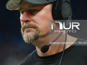 DETROIT,MICHIGAN-November 17: Detroit Lions head coach Dan Campbell looks on during the second half of an NFL football game between the Jack...