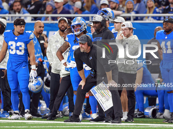 DETROIT,MICHIGAN-NOVEMBER17:  Detroit Lions head coach Dan Campbell looks on from the sidelines during a game between the Detroit Lions and...