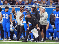 DETROIT,MICHIGAN-NOVEMBER17:  Detroit Lions head coach Dan Campbell looks on from the sidelines during a game between the Detroit Lions and...