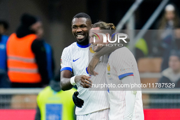 Adrien Rabiot of France celebrates with Marcus Thuram after scoring third goal during the UEFA Nations League 2024/25 League A Group 2 match...