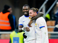 Adrien Rabiot of France celebrates with Marcus Thuram after scoring third goal during the UEFA Nations League 2024/25 League A Group 2 match...