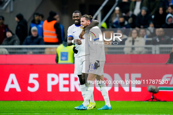 Adrien Rabiot of France celebrates with Marcus Thuram after scoring third goal during the UEFA Nations League 2024/25 League A Group 2 match...