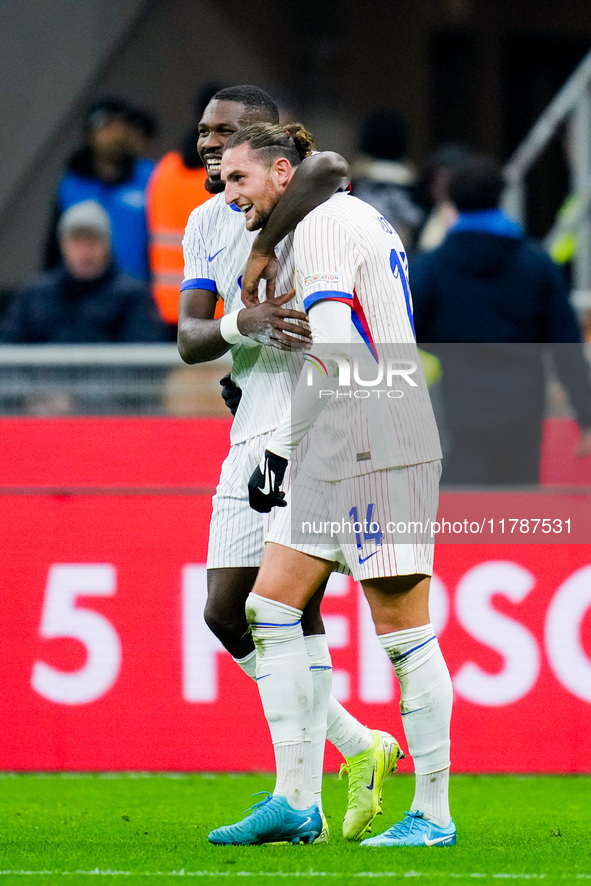 Adrien Rabiot of France celebrates with Marcus Thuram after scoring third goal during the UEFA Nations League 2024/25 League A Group 2 match...