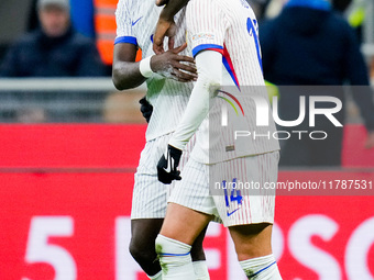 Adrien Rabiot of France celebrates with Marcus Thuram after scoring third goal during the UEFA Nations League 2024/25 League A Group 2 match...