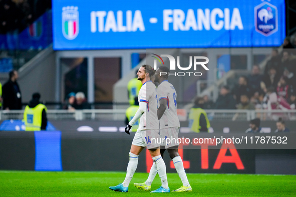 Adrien Rabiot of France celebrates with Marcus Thuram after scoring third goal during the UEFA Nations League 2024/25 League A Group 2 match...