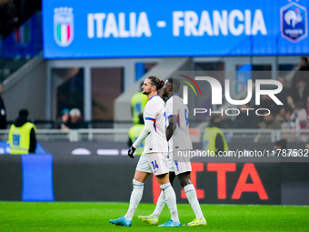 Adrien Rabiot of France celebrates with Marcus Thuram after scoring third goal during the UEFA Nations League 2024/25 League A Group 2 match...