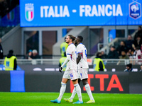 Adrien Rabiot of France celebrates with Marcus Thuram after scoring third goal during the UEFA Nations League 2024/25 League A Group 2 match...