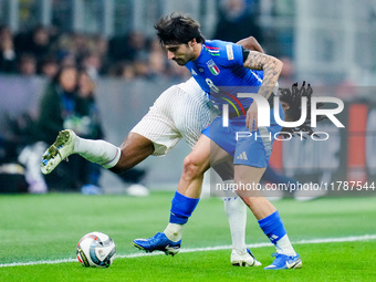 Sandro Tonali of Italy and Jules Kounde' of France compete for the ball during the UEFA Nations League 2024/25 League A Group 2 match betwee...