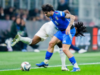 Sandro Tonali of Italy and Jules Kounde' of France compete for the ball during the UEFA Nations League 2024/25 League A Group 2 match betwee...