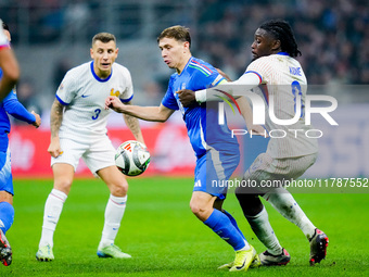 Manu Kone' of France and Nicolo' Barella of Italy compete for the ball during the UEFA Nations League 2024/25 League A Group 2 match between...