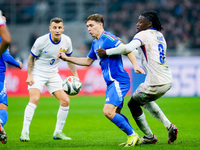 Manu Kone' of France and Nicolo' Barella of Italy compete for the ball during the UEFA Nations League 2024/25 League A Group 2 match between...