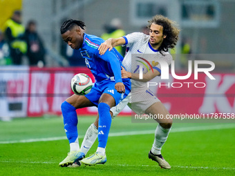 Destiny Udogie of Italy and Matteo Guendouzi of France compete for the ball during the UEFA Nations League 2024/25 League A Group 2 match be...