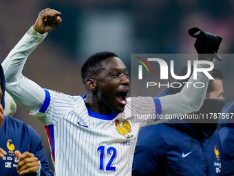 Randal Kolo Muani of France celebrates the victory at the end of the UEFA Nations League 2024/25 League A Group 2 match between Italy and Fr...