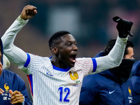 Randal Kolo Muani of France celebrates the victory at the end of the UEFA Nations League 2024/25 League A Group 2 match between Italy and Fr...