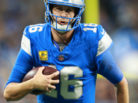 DETROIT,MICHIGAN-NOVEMBER17:  Quarterback Jared Goff (16) of the Detroit Lions runs the ball during a game between the Detroit Lions and the...