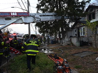 The FDNY responds to the scene in Queens Village, New York, United States, on November 17, 2024. One person is killed in a fire that affects...