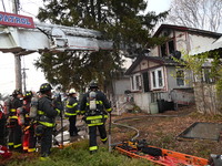 The FDNY responds to the scene in Queens Village, New York, United States, on November 17, 2024. One person is killed in a fire that affects...