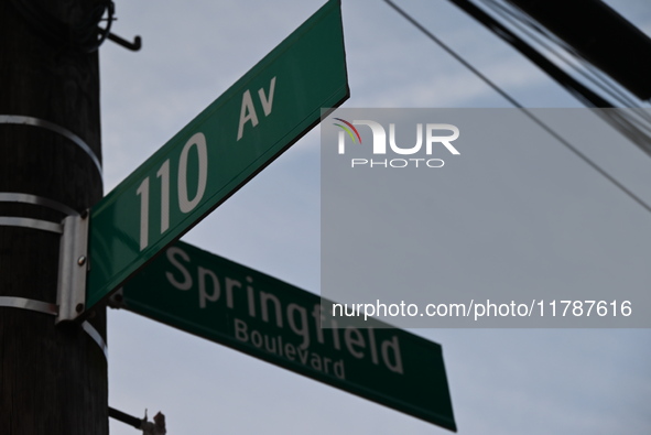 Street signage is at the scene in Queens Village, New York, United States, on November 17, 2024. One person is killed in a fire that affects...