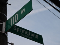 Street signage is at the scene in Queens Village, New York, United States, on November 17, 2024. One person is killed in a fire that affects...