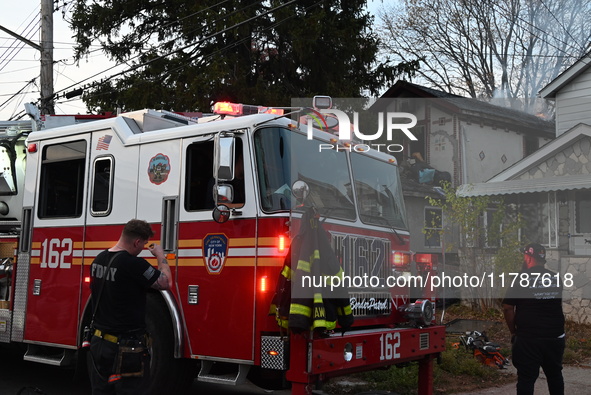 The FDNY responds to the scene in Queens Village, New York, United States, on November 17, 2024, where flames come from a home. One person i...