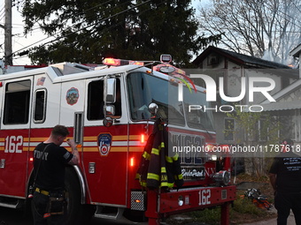 The FDNY responds to the scene in Queens Village, New York, United States, on November 17, 2024, where flames come from a home. One person i...