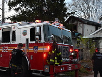 The FDNY responds to the scene in Queens Village, New York, United States, on November 17, 2024, where flames come from a home. One person i...