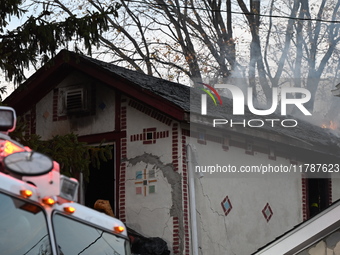 Flames come from the home on Sunday afternoon in Queens Village. One person is killed in a fire that affects a residence at 218-59 110th Ave...