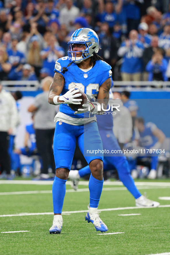 DETROIT,MICHIGAN-November 17: Detroit Lions running back Jahmyr Gibbs (26) reacts after a play during the first half of an NFL football game...