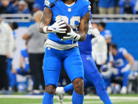 DETROIT,MICHIGAN-November 17: Detroit Lions running back Jahmyr Gibbs (26) reacts after a play during the first half of an NFL football game...