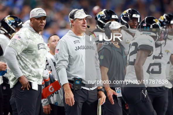 DETROIT,MICHIGAN-NOVEMBER17:  Jacksonville Jaguars head coach Doug Pederson communicates from the sidelines during a game between the Detroi...