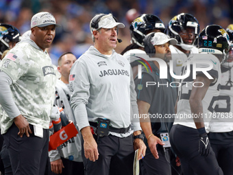 DETROIT,MICHIGAN-NOVEMBER17:  Jacksonville Jaguars head coach Doug Pederson communicates from the sidelines during a game between the Detroi...