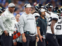 DETROIT,MICHIGAN-NOVEMBER17:  Jacksonville Jaguars head coach Doug Pederson communicates from the sidelines during a game between the Detroi...