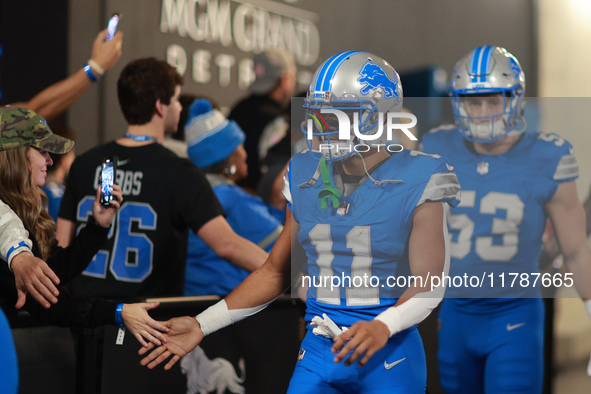 DETROIT,MICHIGAN-November 17: Detroit Lions wide receiver Kalif Raymond (11) heads to the field in the tunnel during an NFL football game be...