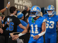 DETROIT,MICHIGAN-November 17: Detroit Lions wide receiver Kalif Raymond (11) heads to the field in the tunnel during an NFL football game be...