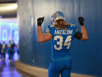 DETROIT,MICHIGAN-November 17: Detroit Lions linebacker Alex Anzalone (34) heads to the field in the tunnel during an NFL football game betwe...