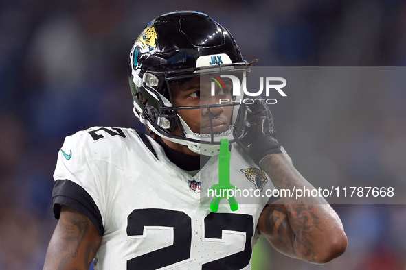 DETROIT,MICHIGAN-NOVEMBER17:  Cornerback Jarrian Jones (22) of the Jacksonville Jaguars adjusts his helmet during a game between the Detroit...