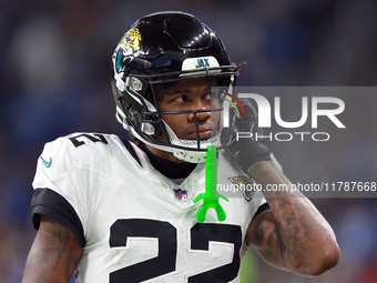 DETROIT,MICHIGAN-NOVEMBER17:  Cornerback Jarrian Jones (22) of the Jacksonville Jaguars adjusts his helmet during a game between the Detroit...