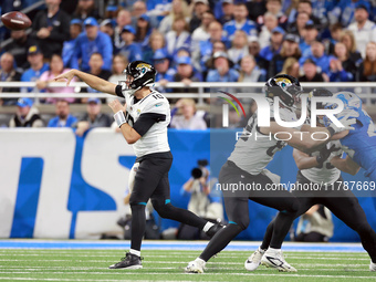 DETROIT,MICHIGAN-NOVEMBER17:  Quarterback Mac Jones (10) of the Jacksonville Jaguars throws the ball during a game between the Detroit Lions...