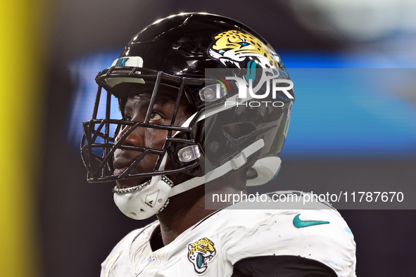 DETROIT,MICHIGAN-NOVEMBER17:  Linebacker Foyesade Oluokun (23) of the Jacksonville Jaguars looks on from the sidelines during a game between...