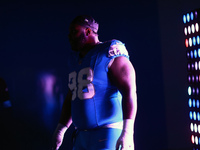 DETROIT,MICHIGAN-November 17: Detroit Lions defensive tackle DJ Reader (98) heads to the field in the tunnel during an NFL football game bet...