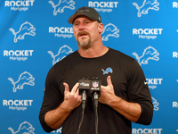 DETROIT,MICHIGAN-NOVEMBER17:  Detroit Lions head coach Dan Campbell answers questions during a post-game interview after a game between the...