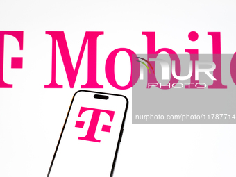 The T-Mobile logo is seen in this illustration photo taken in Warsaw, Poland on 17 November, 2024. (