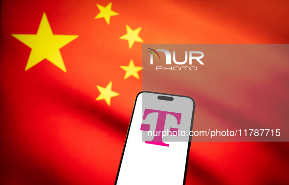 The T-Mobile logo and a Chinese flag are seen in this illustration photo taken in Warsaw, Poland on 17 November, 2024. T-Mobile is one of se...