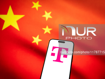 The T-Mobile logo and a Chinese flag are seen in this illustration photo taken in Warsaw, Poland on 17 November, 2024. T-Mobile is one of se...