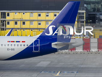 SAS Connect Airbus A320neo aircraft spotted taxiing at London Heathrow Airport LHR in front of the terminal and the air control tower. The m...