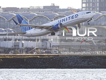 United Airlines Boeing 737 MAX 8 aircraft spotted departing from LaGuardia Airport in New York City during take off and flying phase in the...