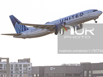 United Airlines Boeing 737 MAX 8 aircraft spotted departing from LaGuardia Airport in New York City during take off and flying phase in the...